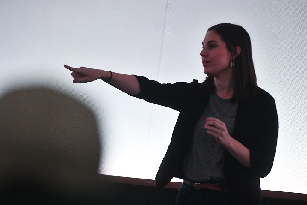 Meaghann Stoelting moderates a panel discussion